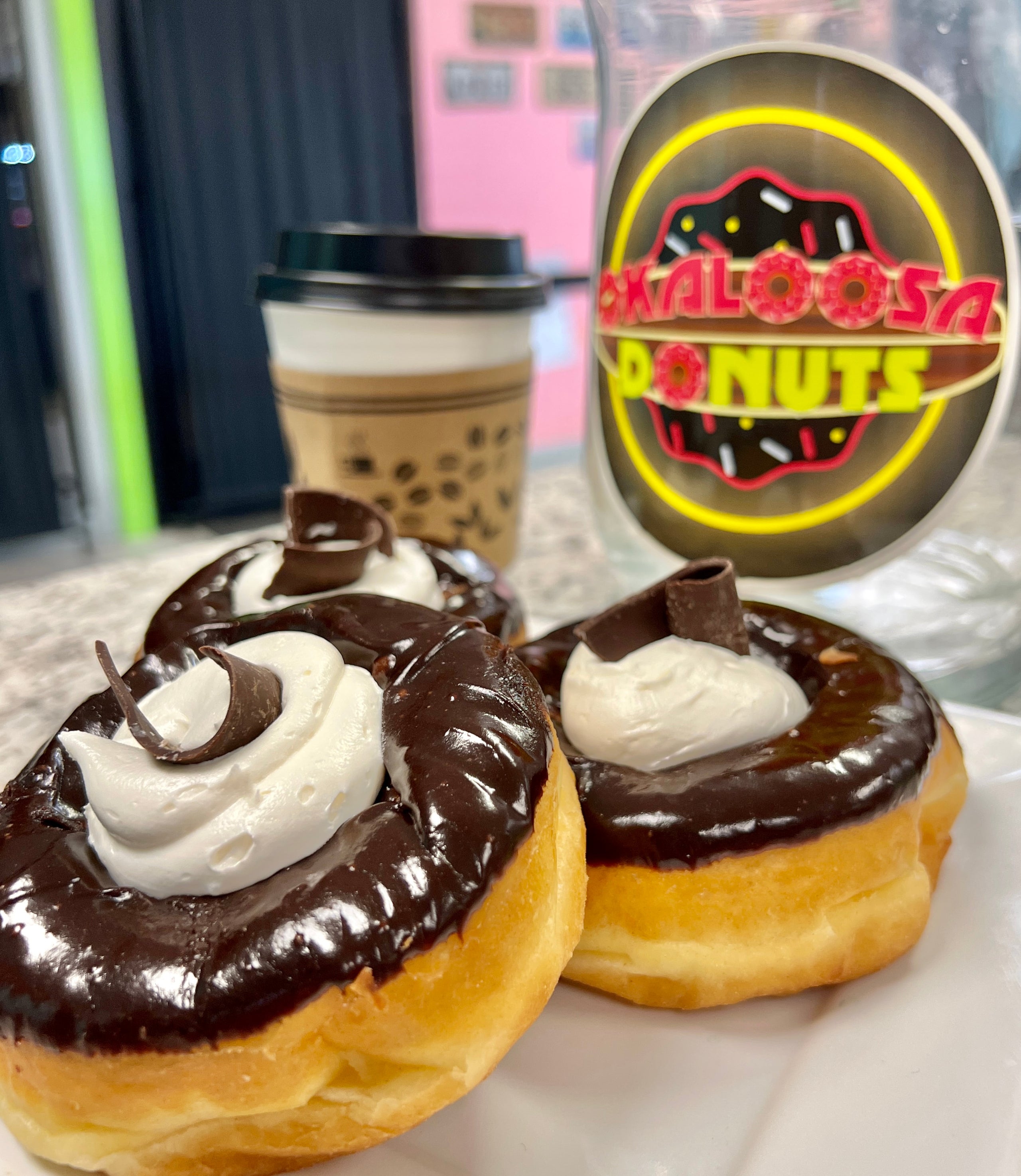 Holland / Eclair Okaloosa Yummies (Donuts) Gourmet Donuts, Artisan